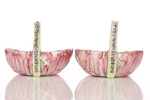Lot 109 - A pair of Chinese famille rose nose cups, each...