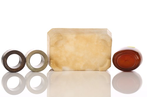 Lot 289 - Two Chinese jade archers rings, internal...