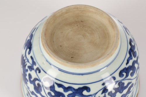 Lot 67 - A Chinese blue & white deep sided bowl, in the...