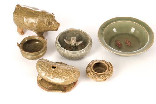 Lot 153 - Chinese celadons, comprising a pig, a squat...