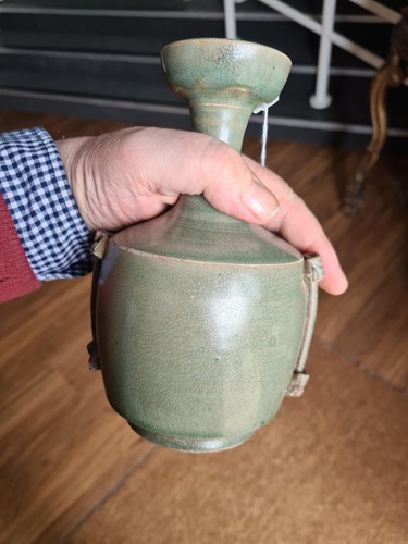 Lot 143 - A Chinese celadon vase, in the tang style, of...