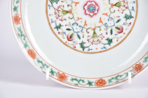 Lot 190 - A Chinese famille rose saucer dish, painted...