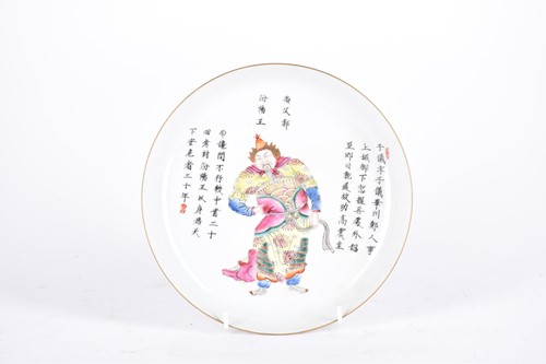 Lot 167 - A Chinese famille rose saucer dish, painted...