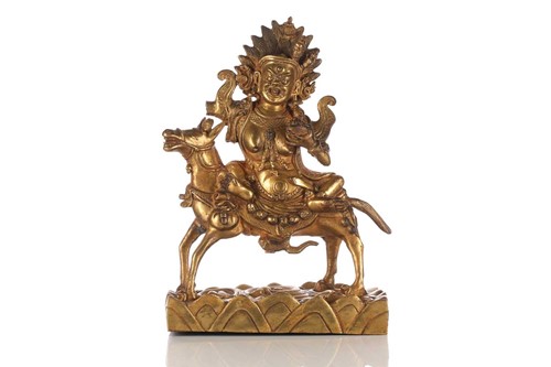 Lot 194 - A Sino-Tibetan gilt-bronze figure of Palden...