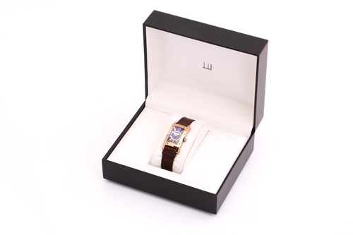 Lot 396 - A limited-edition Dunhill Citytamer 18ct gold...