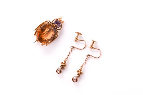 Lot 180 - A citrine and amethyst bug brooch and a pair...