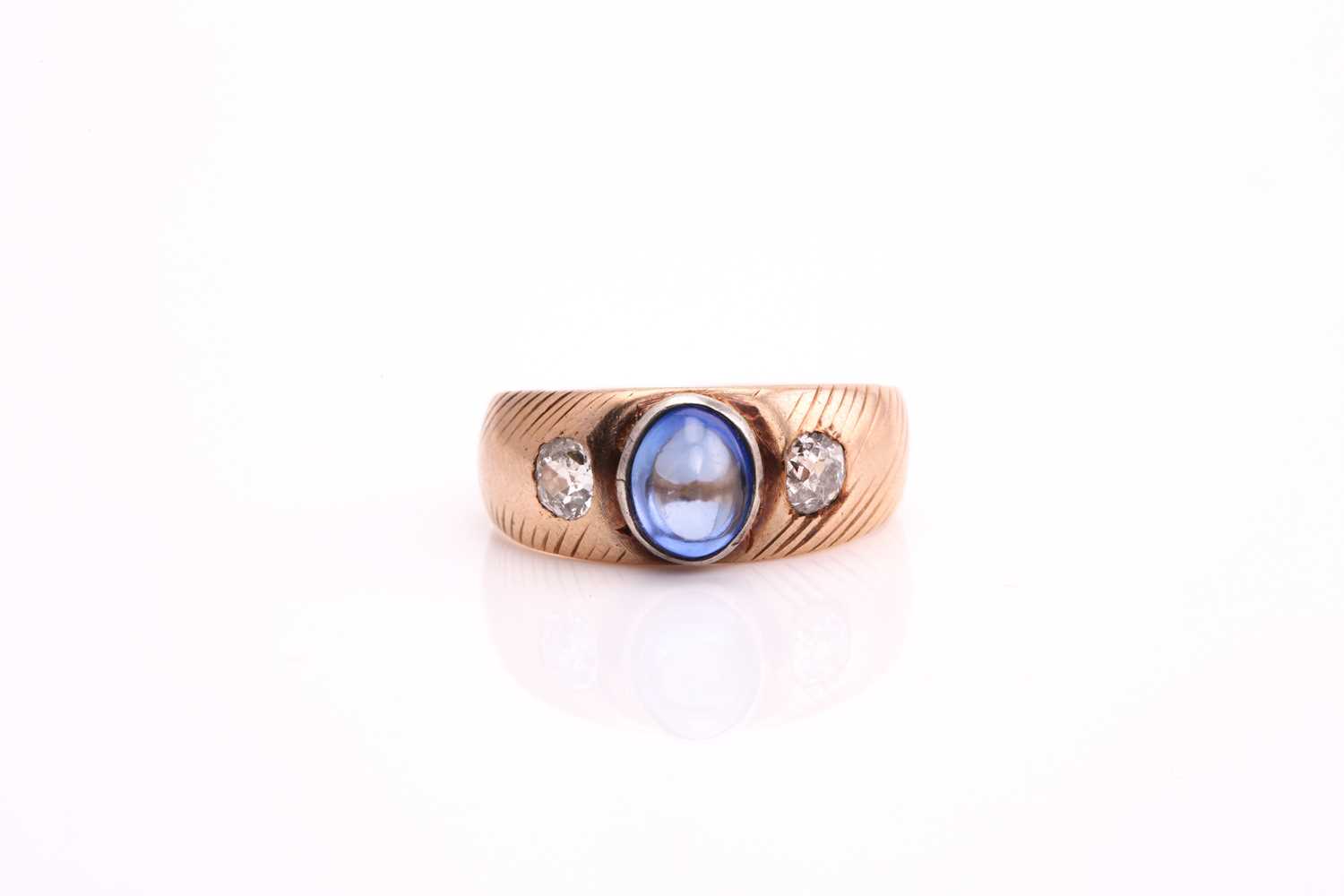 Lot 173 - A sapphire and old-cut diamond ring, comprises...