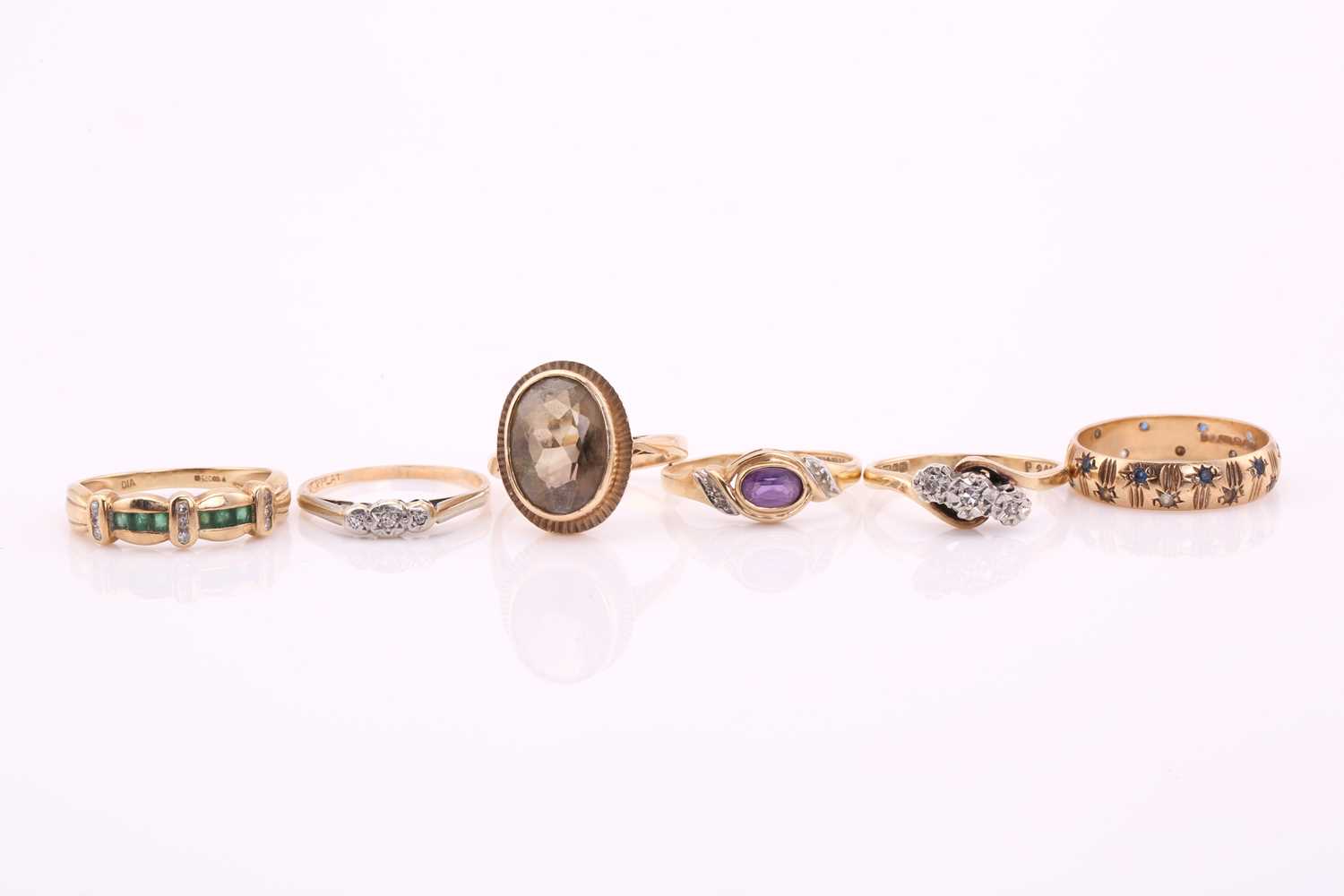 Lot 160 - A collection of six rings. A ring with faceted...