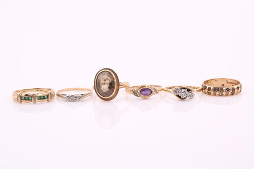 Lot 160 - A collection of six rings. A ring with faceted...