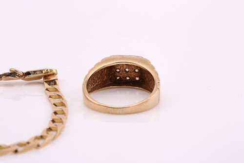 Lot 234 - A 9ct bi-coloured gold ring and a curb chain...