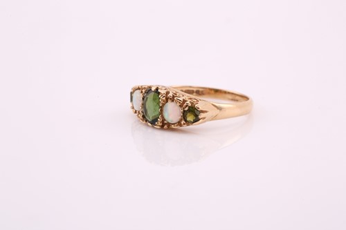 Lot 23 - A tourmaline and opal dress ring, comprises a...