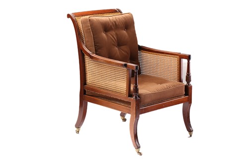 Lot 236 - A Regency mahogany Bergere library armchair...