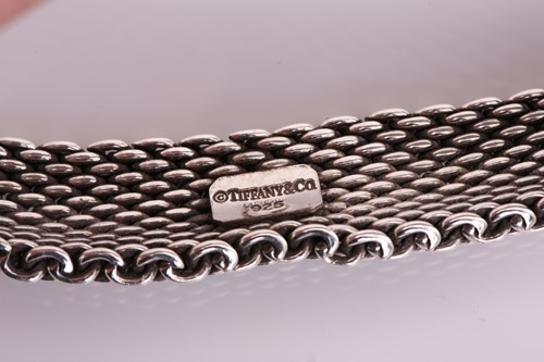 Lot 210 - A Tiffany & Co. 'Somerset' mesh bracelet in...
