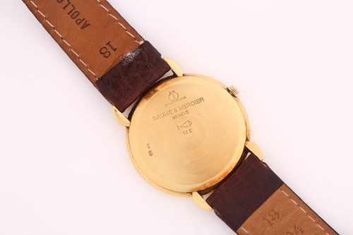 Lot 411 - An 18ct yellow gold Baume & Mercier wristwatch...