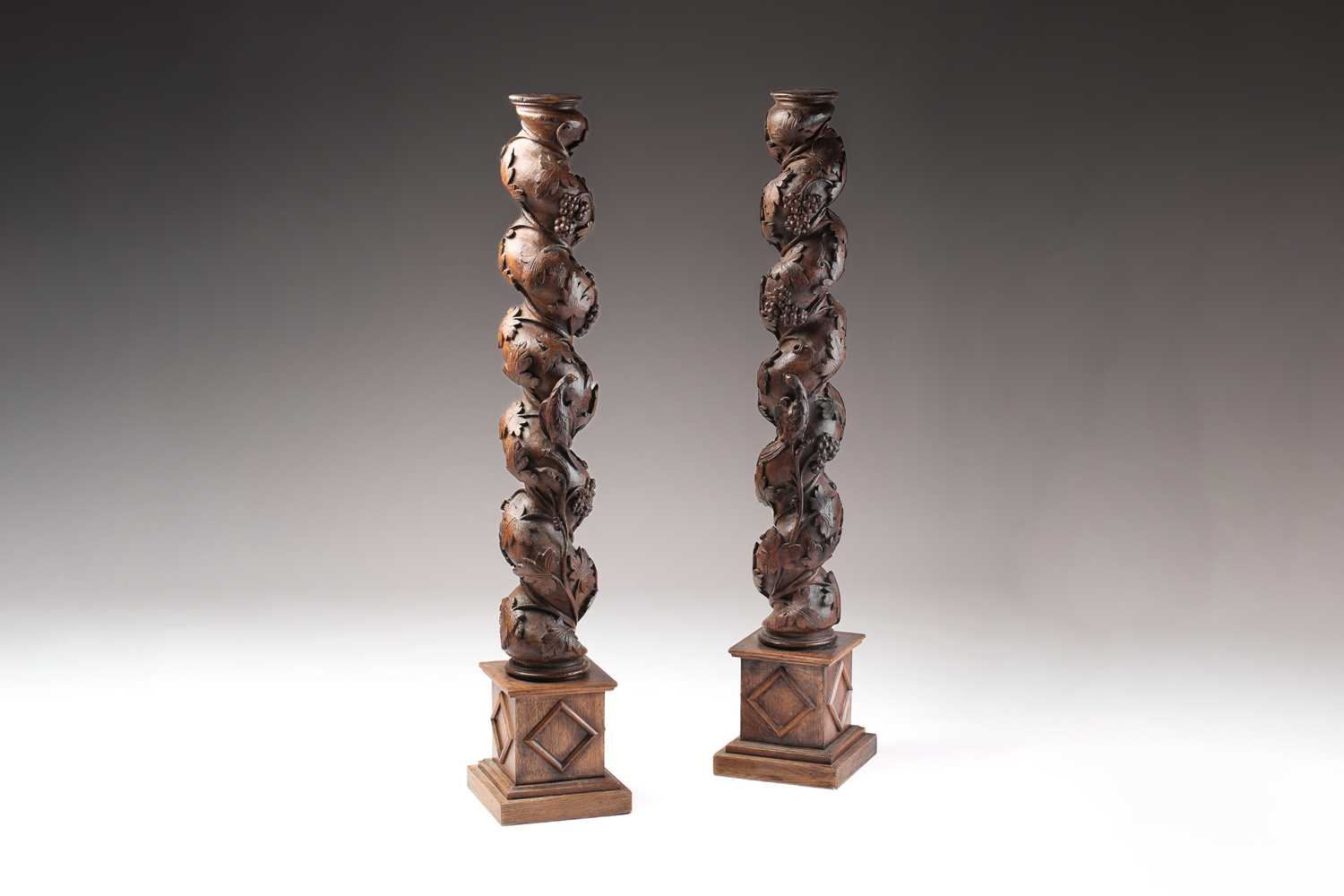 Lot 294 - A pair of carved oak architectural "Solomonic"...