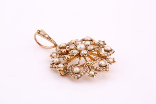 Lot 140 - A late Victorian split pearl star brooch cum...