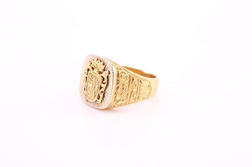 Lot 74 - A gold signet ring, featuring a carved coat of...