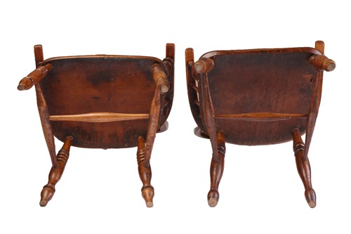 Lot 230 - A 19th century Windsor high hoop back elm and...