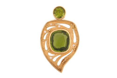 Lot 282 - A Catherine Best peridot pendant together with...