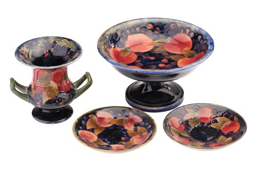 Lot 319 - Four items of Moorcroft pottery in the...