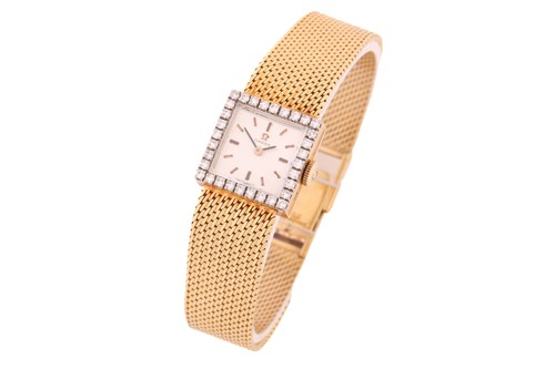 Lot 413 - An Omega diamond set dress watch, with a Swiss-...