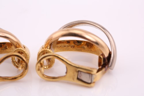 Lot 82 - A pair of Cartier tri-coloured earrings, each...
