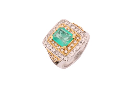 Lot An emerald and diamond three-tier dress ring,...