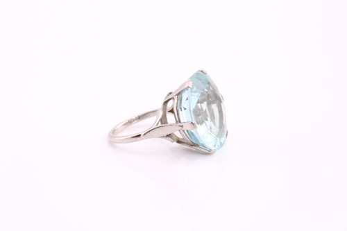 Lot 152 - An aquamarine ring, comprises a round mix-cut...