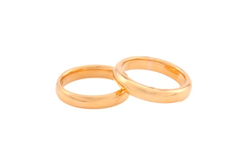 Lot 176 - Two 22ct yellow gold wedding court bands, one...