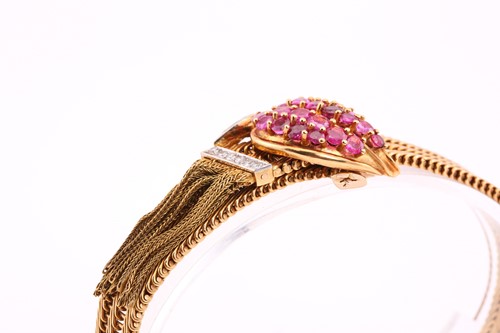Lot 50 - A Kutchinsky ruby and diamond slide bracelet,...