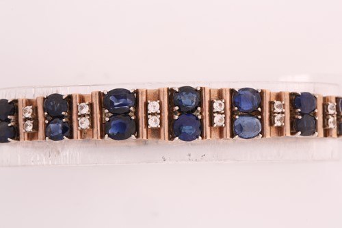 Lot 75 - A sapphire and white stone bracelet, comprises...