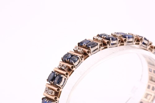 Lot 75 - A sapphire and white stone bracelet, comprises...