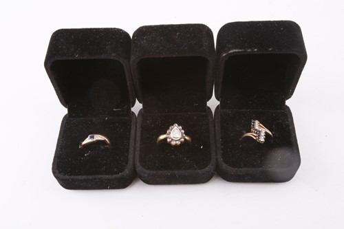 Lot 47 - Three gem-set rings, one with a square...