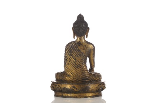 Lot 70 - A Chinese Sino Tibetan style gilt bronze...