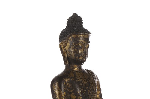 Lot 70 - A Chinese Sino Tibetan style gilt bronze...