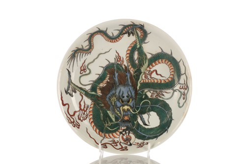 Lot 117 - A Chinese Famille Verte dragon dish, painted...