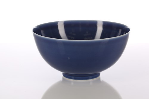 Lot 75 - A Chinese blue glazed deep sided bowl, the...