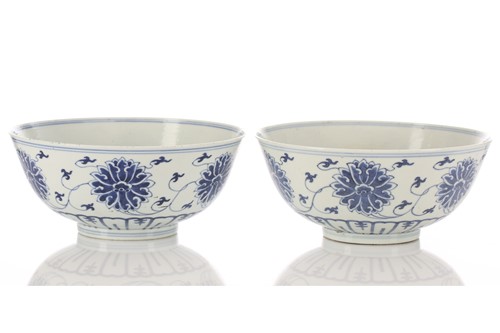 Lot 120 - A pair of Chinese blue & white lotus bowls,...