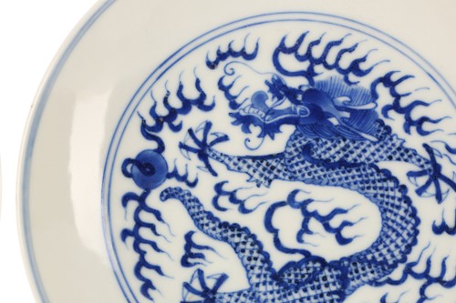 Lot 96 - A pair of Chinese blue & white dragon dishes,...