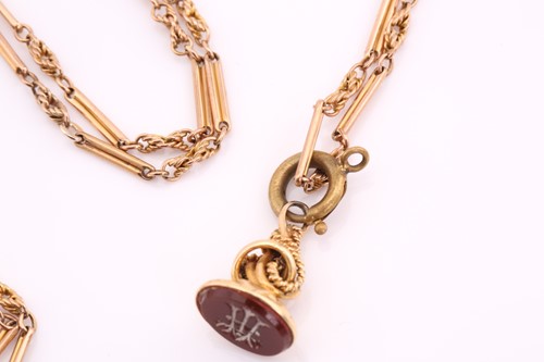 Lot 167 - A long fancy chain with glass pendant and fob...