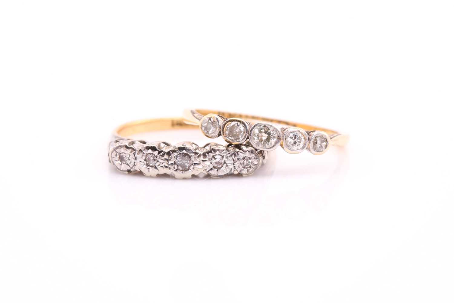 Lot 169 - Two five-stone diamond rings, one consists of...