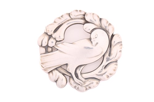 Lot 330 - Georg Jensen - A silver brooch, depicting dove...