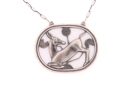 Lot 322 - Georg Jensen - a necklace with kneeling deer...