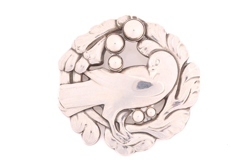 Lot 320 - Georg Jensen - A silver brooch, depicting dove...