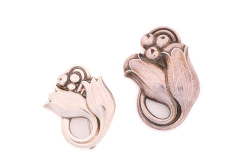 Lot 314 - Two Georg Jensen tulip brooches - The first is...