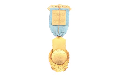 Lot 126 - An 18ct gold and enamel Masonic medal, the...