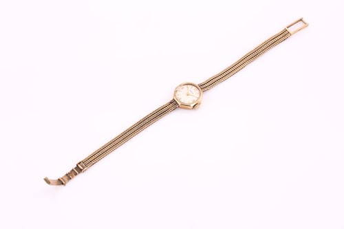 Lot 411 - A Marvin lady's wristwatch in 9ct yellow gold,...