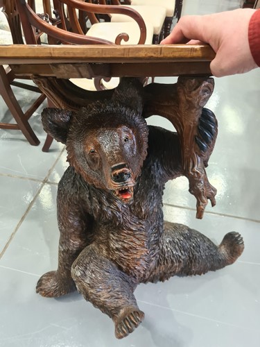 Lot 259 - A 20th-century "Black Forest" bear side table...