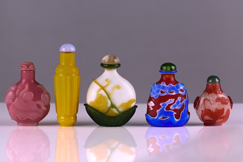 Lot 83 - Five Chinese Peking glass style snuff bottles,...