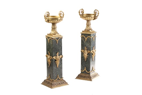Lot 247 - A pair of gilt bronze and green marble two...